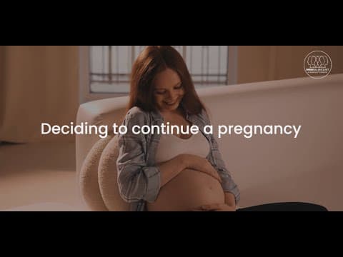 Deciding to continue a pregnancy.